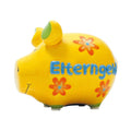 Keramik Sparschwein, intensives Gelb, grüne Details (Füße und Schweinohren), Blaue Aufschrift: Elterngel, orangene Blumen, gesichtszüge in schwarz, 9 x 9 x 12,5 cm großes Sparschwein, glänzende Oberfläche