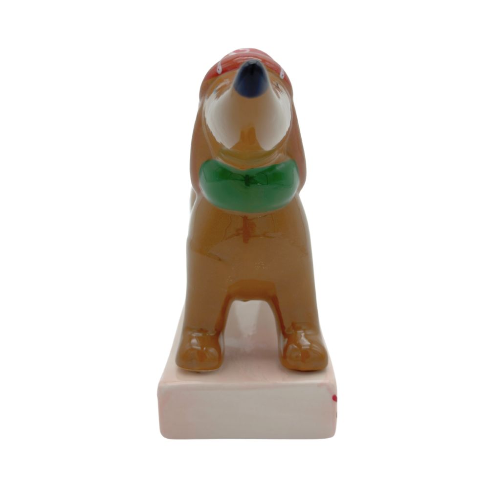 Kerzenhalter kleiner Dackel mit roter Mütze für Stabkerzen