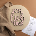 Wanddekoration Pinker Schriftzug "Ich lieb uns"