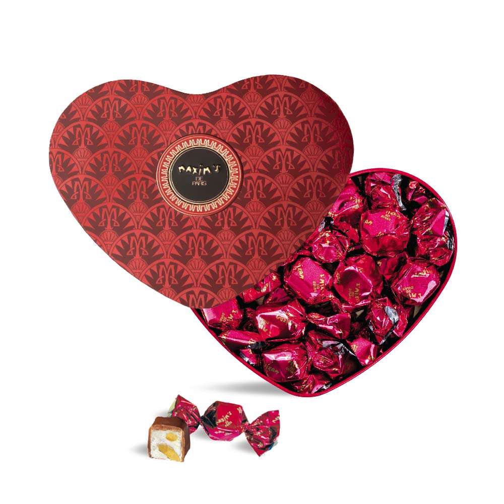 Rotes Herz mit Pralinen