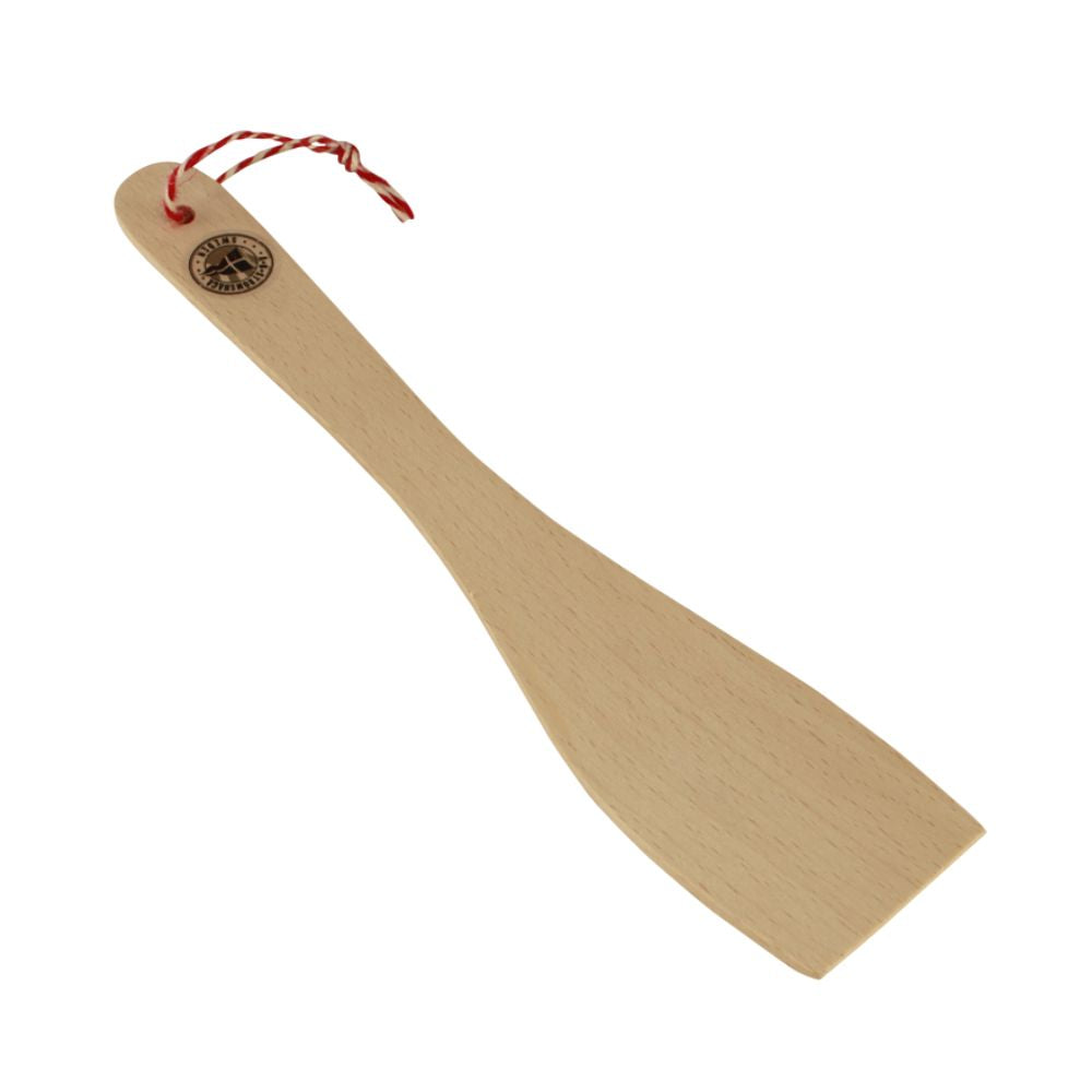 Ein schlichter Pfannenwender aus Holz mit einem rot weißen Band zum aufhängen