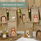 Vierundzwanzig braune Papiertüten des DIY Adventskalenders mit verschiedenen aufgeklebten Tieren und der Info "Mit vierundzwanzig dekorativen Holz-Klammern"