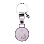 Ring mit Schlüsselanhänger mit einem kleinen Engel und einem runden Symbol in dem steht "Ein Engel für dich!" mit pinkem Hintergrund