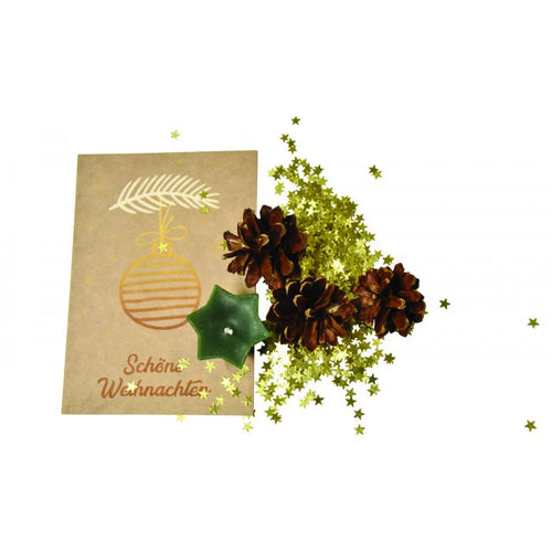 Eine Weihnachtskarte mit der Aufschrift "Schöne Weihnachten" und Dekor