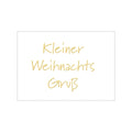 Eine weiße Postkarte auf der eine goldene Schrift "Kleiner Weihnachts Gruß" aufgedruckt ist