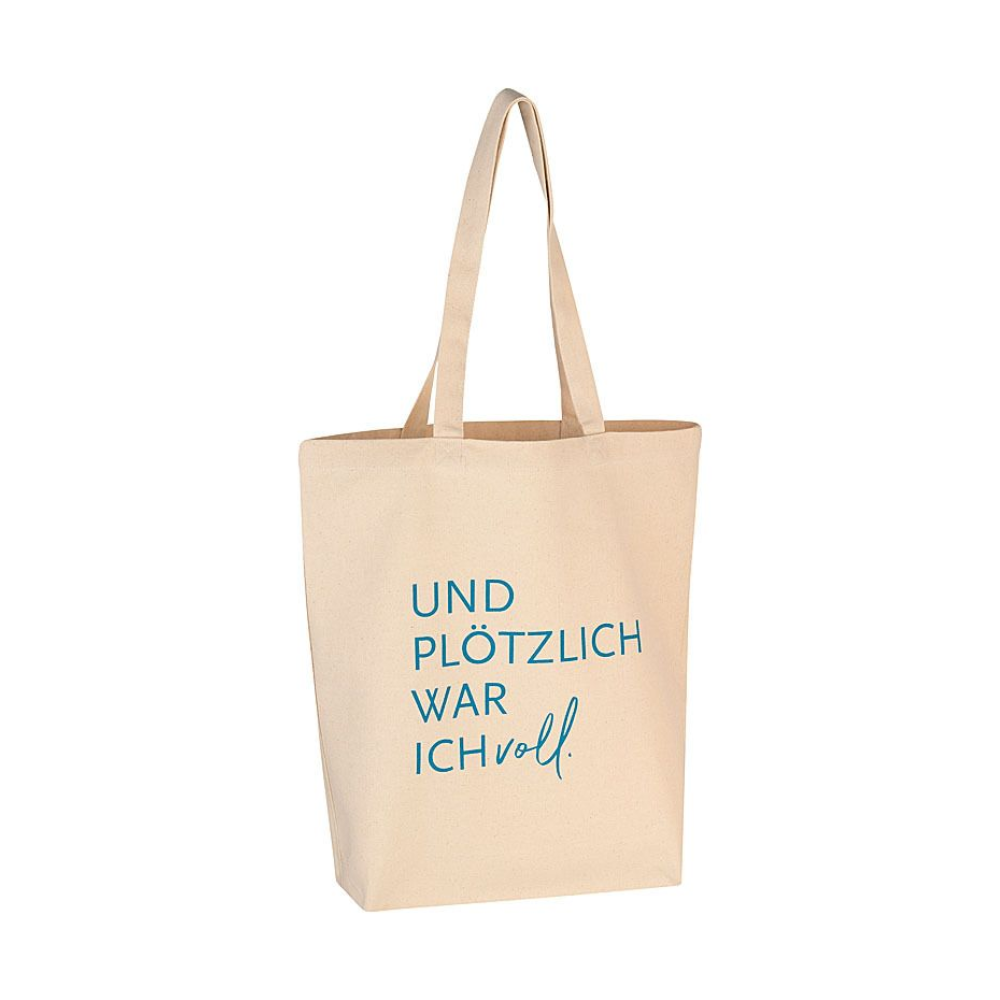 Eine Tasche mit Blauen Print und dem Spruch ''Und plötzlich war ich voll'' von 17;30