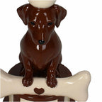 Nahaufnahme des Kerzenhalters in Dackel-Form mit Knochen