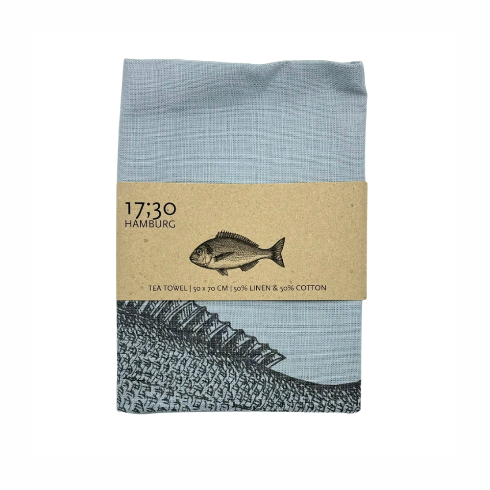 Ein Geschirrtuch mit einem Grauen FIsch drauf