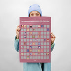 Ein eine Pinke Liste mit 100 Herausforderungen für Pärchen mit jewaligen Bildern zu den Herausforderungen.