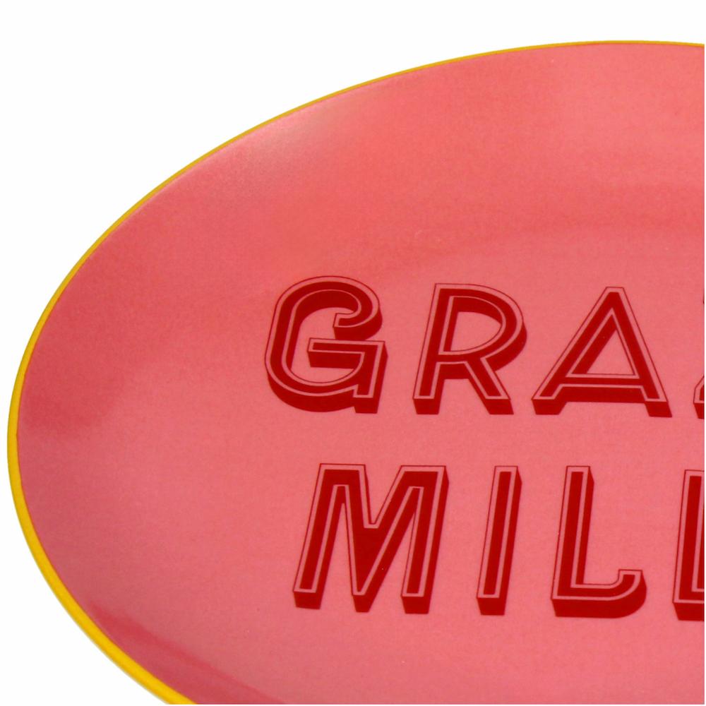 Nahaufnahme des Tellers mit der Schrift "GRAZIE MILLE"