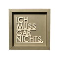 Quadratische Taupe Wanddekoration mit dem Spruch "Ich muss gar nichts."