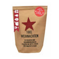 Eine braune wundertüte mit einer schwarzen Aufschirft "100% Weihnachten - zu Risiken und Nebenwirkungen fragen sie bitte ihren Weihnachtsmann!". In der Mitte der Tüte ist ein roter Filz-Stern aufgeklebt