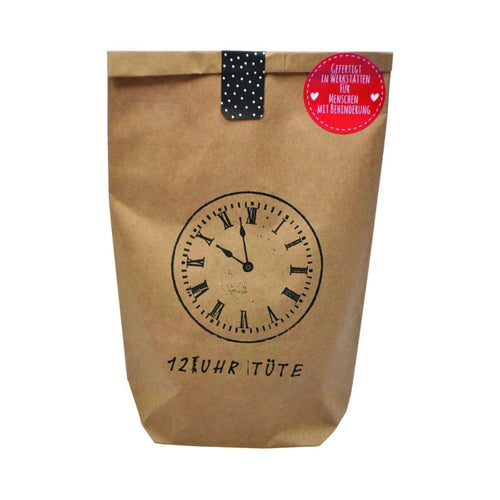 Braune Wundertüte mit einem schwarzen Aufdruck einer Altmodischen Uhr und der Schrift "12 Uhr Tüte"