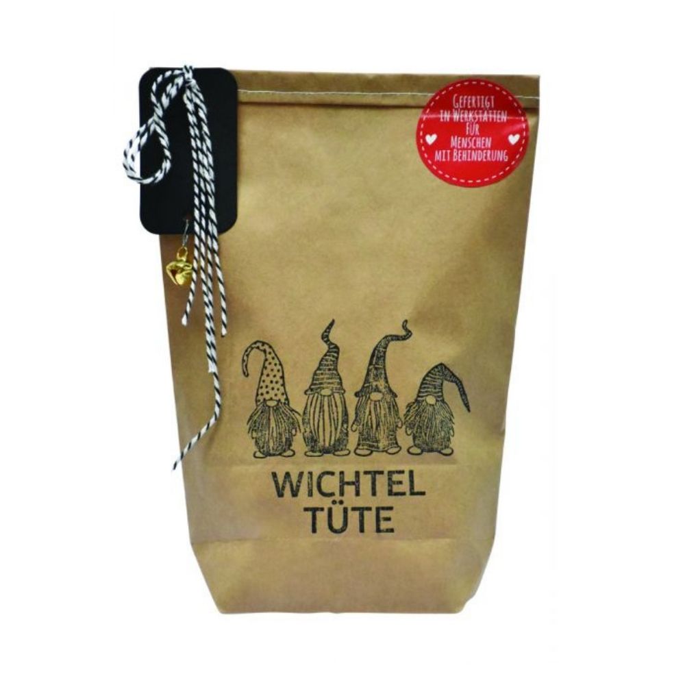 Wundertüte mit einem Aufdruck von vier kleinen langbärtigen Wichteln und der Schrift "WICHTEL TÜTE", oben links ist ein Kärtchen mit einem Bändchen gebunden