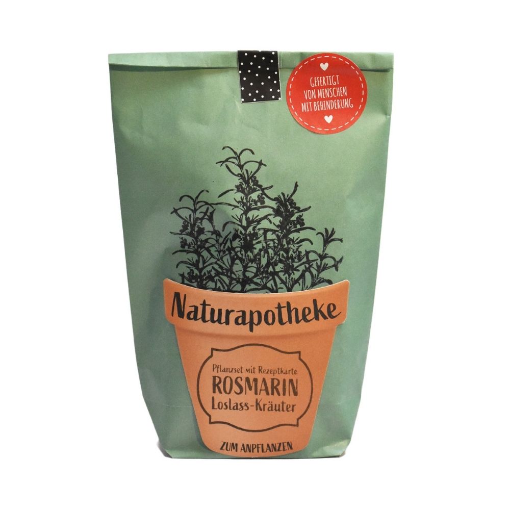 Grüne Wundertüte mit einem aufgeklebten Topf auf dem "Naturaphotheke Pflanzset Rosmarin" steht und aufgedrucktem Rosmarin das aus dem Topf wächst