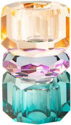 Ein hoher wendbarer Dioptrics Kerzenhalter aus Glas in Petrol, Violett und Pfirsich Kristall-Optik, bestehend aus mehreren geometrischen Flächen. Der Kerzenhalter hat eine moderne, facettierte Optik, die das Licht reflektiert