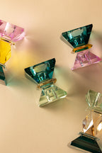 Gleiche Kristallhalter Form in verschiednen Farbtönen