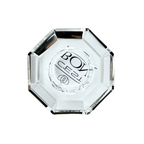 Ein kleiner Dioptrics Kerzenhalter aus Glas in Klarer Kristall-Optik, bestehend aus mehreren geometrischen Flächen. Der Kerzenhalter hat eine moderne, facettierte Optik, die das Licht reflektiert