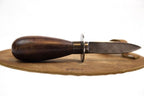 Austernmesser mit Lederhandschuh