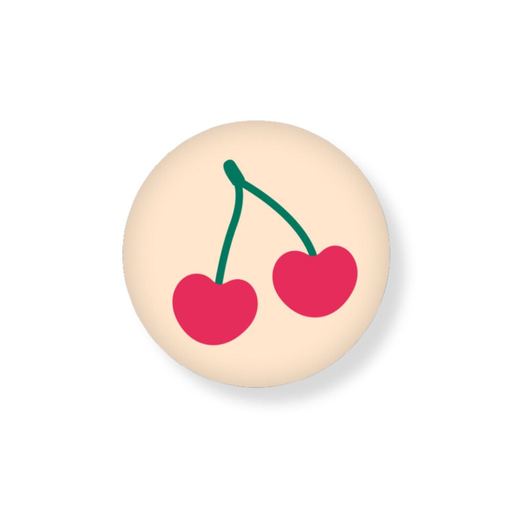 Runder Magnet mit Beige Hintergrund und einem Kirschen Motiv