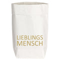Tüte aus Kraftpapier mit einer aufgedruckten goldenen Schrift "Lieblings Mensch"