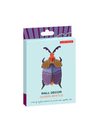 Die "Queen Beetle" Wanddekoration in der Verpackung