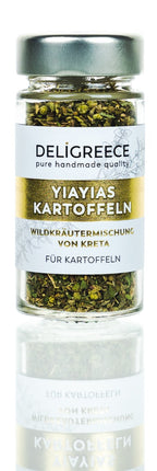 Fläschchen Wildkräutermischung "YIAYIAS Kartoffeln" von Deligreece auf reflektierendem Boden